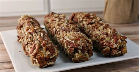 This pecan log recipe is a marshmallow center coated in caramel and rolled in nuts and only ...