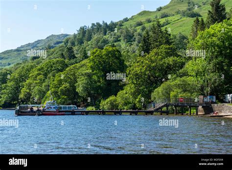 Tarbet Pier on Loch Lomond at Tarbet, Scotland, UK Stock Photo - Alamy