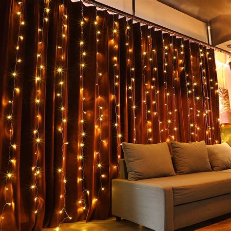 TORCHSTAR Extendable 9.8ft x 9.8ft LED Curtain Lights, Starry Christmas String Light, Indoor ...