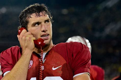 Stanford quarterback Andrew Luck looks up at the scoreboard | UWire