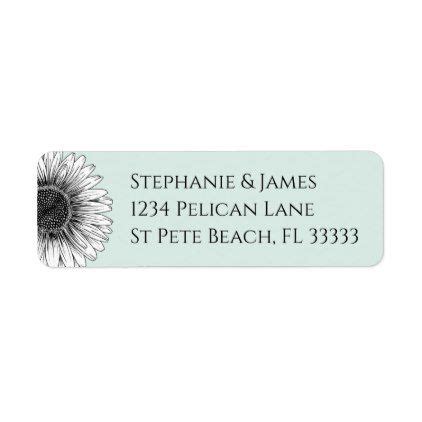 a white and black sunflower on a light green background return address labels are shown