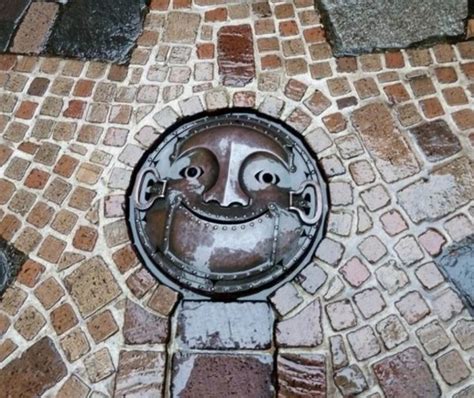 Manhole Art (27 pics)