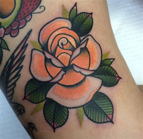 Orange rose | Rose tattoo sleeve, Traditional tattoo, Body art tattoos