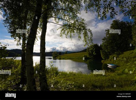 Serene serenity scene on peaceful lake foothill Stock Photo - Alamy