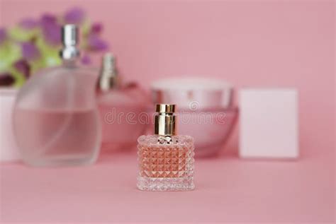 Perfume Bottle on Light Pink Background. Perfumery, Cosmetics, Fragrance Collection. Stock Photo ...