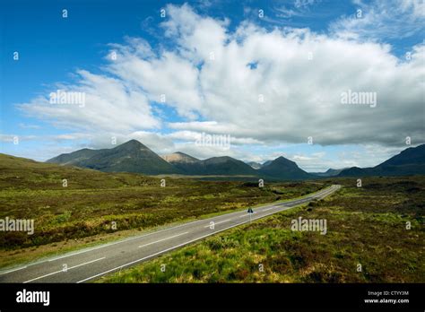 Paved road in rural landscape Stock Photo - Alamy