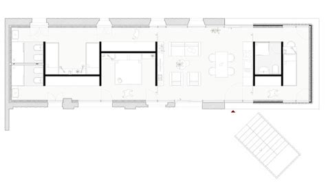 the floor plan for an apartment with three separate rooms and one living room on each side