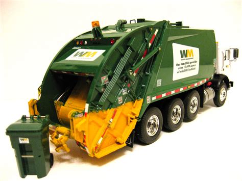 First Gear Waste Management Mack Mr rear load garbage truc… | Flickr