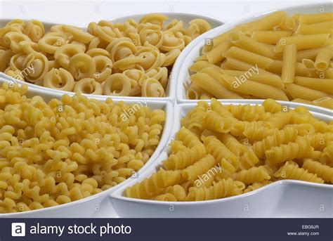 small ceramic bowls with different italian pasta types Stock Photo - Alamy