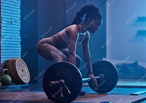 Premium Photo | Strong black woman and focus barbell fitness to deadlift workout heavy exercise ...