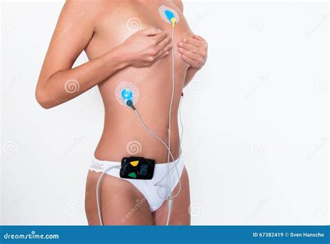 Young Woman Wearing A Heart Monitor Stock Photo - Image: 67382419