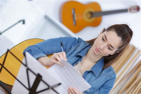 Guitar Lessons Girl Playing Guitar Stock Photo - Image of artist, playing: 101672454