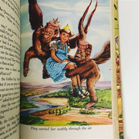 Flying Monkeys Carrying Dorothy Away - Color Illustration from Vintage The Wizard of Oz by L ...