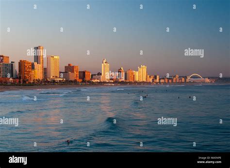 Durban beacfront skyline at sunrise Stock Photo - Alamy