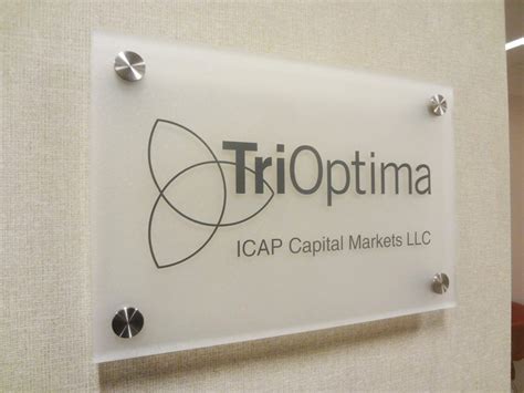Frosted acrylic office sign mounted with stainless steel hardware in New York, NY. We specialize ...