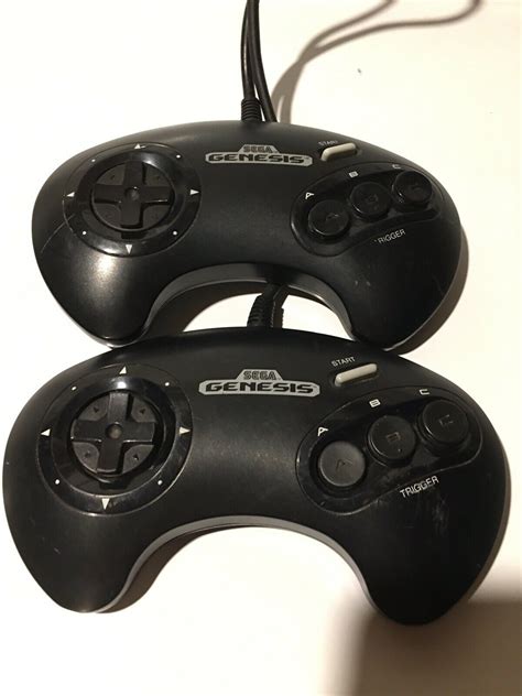 Two Sega Genesis Controllers - iCommerce on Web