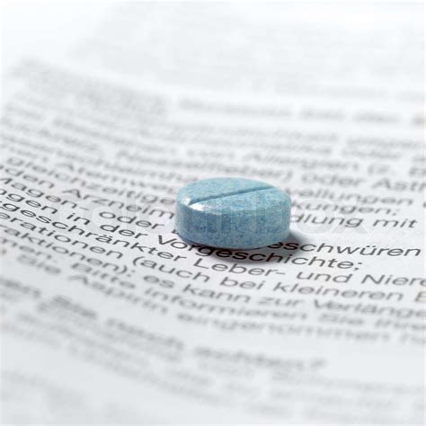 blue pills on package insert | Stock image | Colourbox