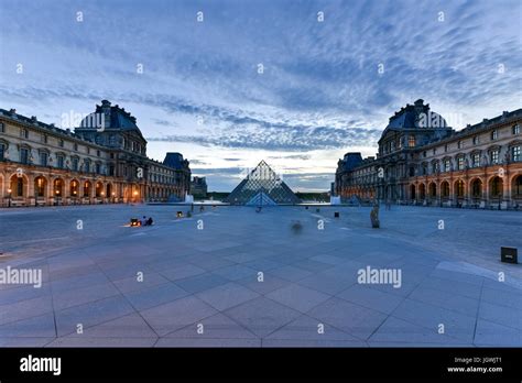 Louvre Museum at night in Paris, France Stock Photo - Alamy