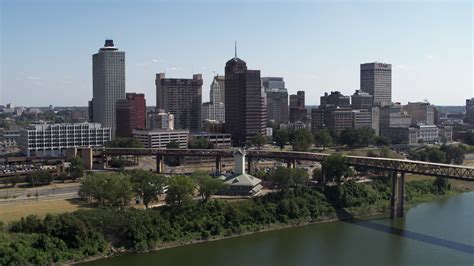 5.7K stock footage aerial video of office towers in the Downtown Memphis, Tennessee skyline seen ...