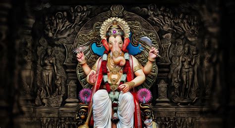 a statue of the god ganesh sitting on a throne