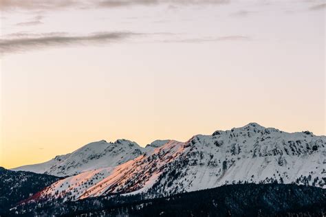 Scenic View Of Snow Capped Mountain During Daytime · Free Stock Photo