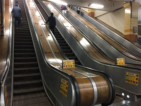 Standing at the bottom of the Wynyard escalators – History of Sydney