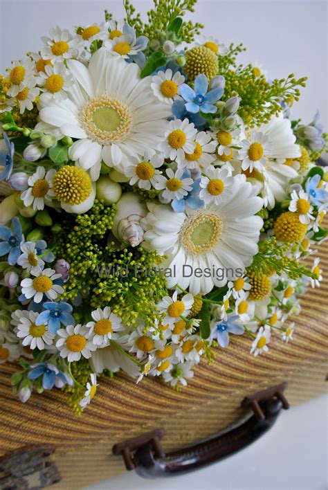 Summer brides bouquet, white Germini, mini Gerbera, Daisy, Solidago, shells, Freesia, Englis ...