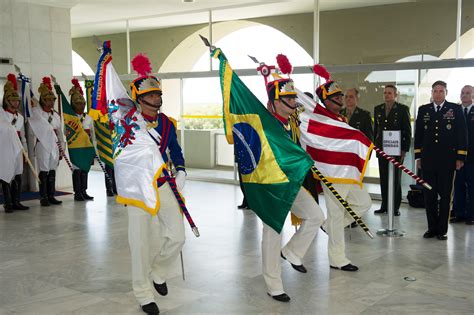 Brazilian soldiers wear traditional uniforms during a ceremony to honor U.S. Army Chief of Staff ...