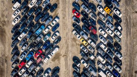 Premium Photo | Aerial view of cars at parking lot