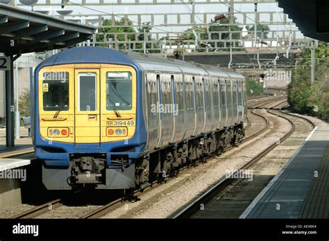 Thameslink class 319 passenger train at a railway station in the UK Stock Photo - Alamy