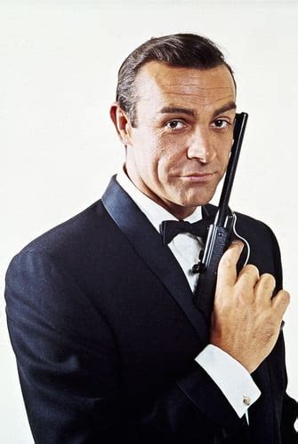 Sean Connery iconic pose as James Bond with Walther P38 gun suave in ...