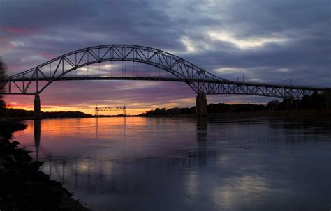 The Bourne Bridge at the Cape Cod Canal during sunset | Captain Farris ...