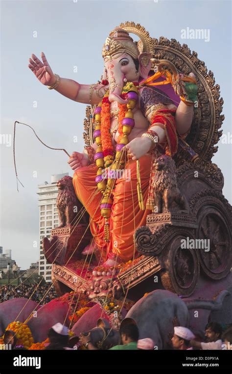 People at religious procession during Ganpati visarjan ceremony, Mumbai, Maharashtra, India ...