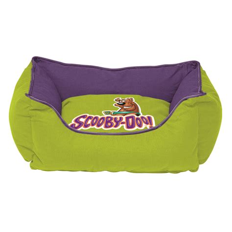 a green and purple dog bed with the word scooby'on on it