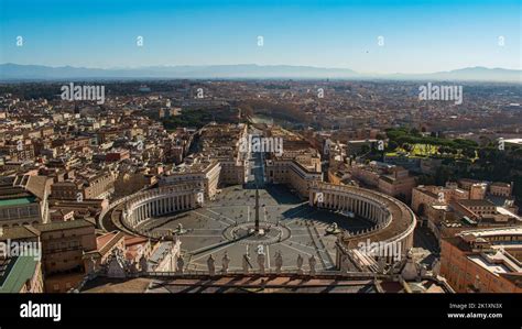 An aerial view of St. Peter's Square surrounded by buildings in Italy Stock Photo - Alamy