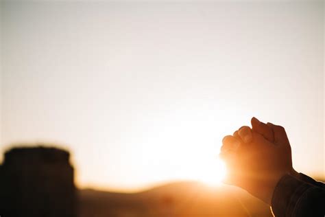 Woman Praying at Sunrise - Church stock photos