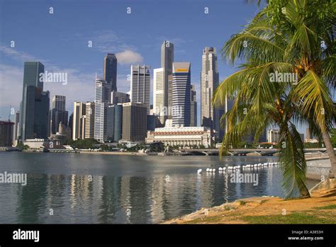 Singapore - City skyline seen across Marina Bay Stock Photo - Alamy