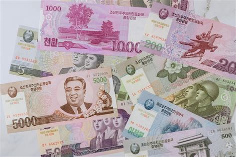 Premium Photo | North korean of various banknotes money won currency bill