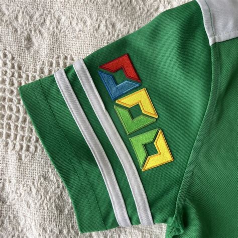 Green soccer jersey Labeled a boys M, fits a women’s... - Depop