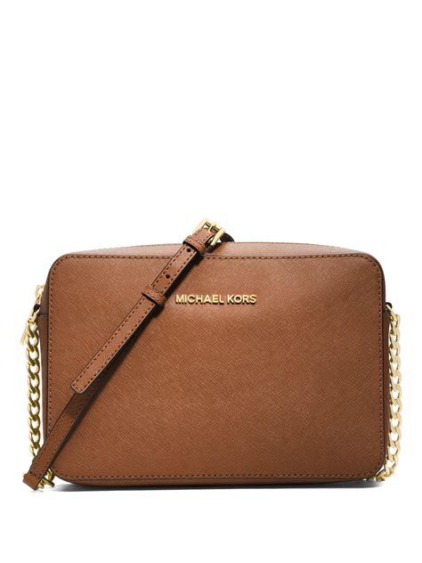 Michael michael kors Jet Set Travel Saffiano Crossbody Bag in Brown (LUGGAGE) | Lyst