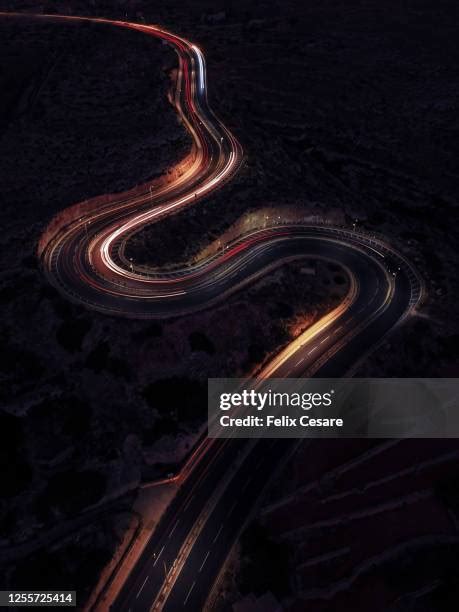 Windy Road At Night Photos and Premium High Res Pictures - Getty Images