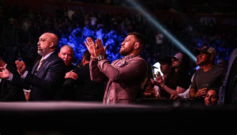 Eddie Alvarez and Chad Mendes react to Conor McGregor yelling advice during their fight at BKFC ...