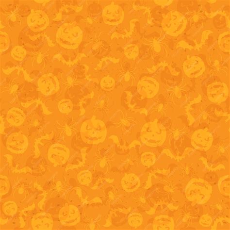 Premium Vector | Seamless orange halloween background