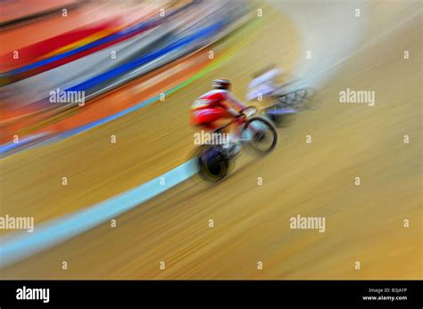 Riders compete in men individual pursuit cycling track race at the 2008 Beijing Olympics Stock ...