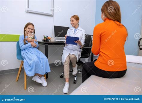 Smiling Doctor and Little Patient during Medical Checkup in Clinic, Friendly Female Pediatrician ...