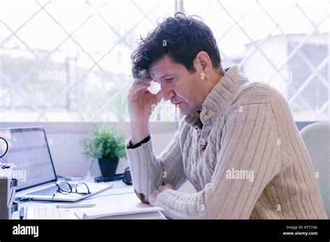 Man stressed at work Stock Photo - Alamy