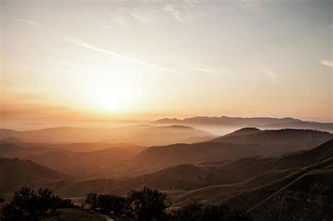 Rolling Hills At Sunset by Christian Adams