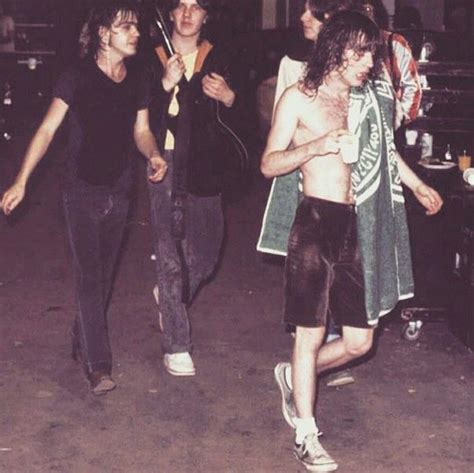 Malcolm and Angus Young - after finishing a show | Angus young, Acdc, Acdc angus young