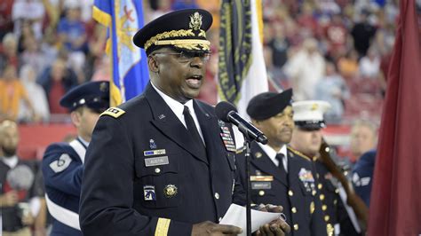 Gen. Lloyd Austin addresses military recruits during an induction ...