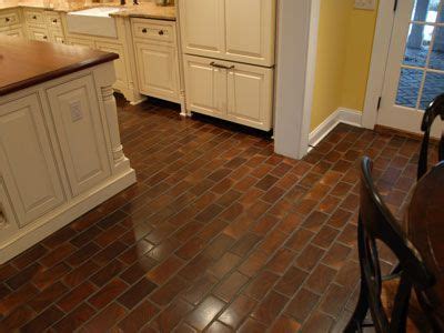 This is a different look for old barn wood flooring. The size and pattern looks like brick, but ...